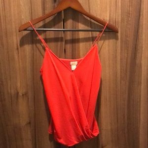 Cute tank with front warp crossover detail